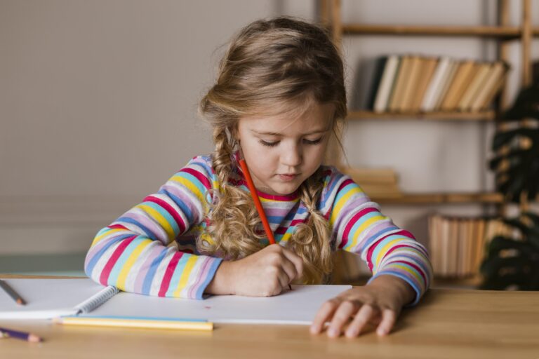 A girl writing or drawing image